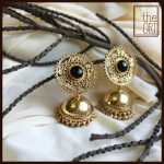 Jhumkas in .925 Sterling Silver with Black Onyx and Gold plating. 55mm length